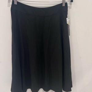 For the Republic. NWT. Black skirt. Size 4.